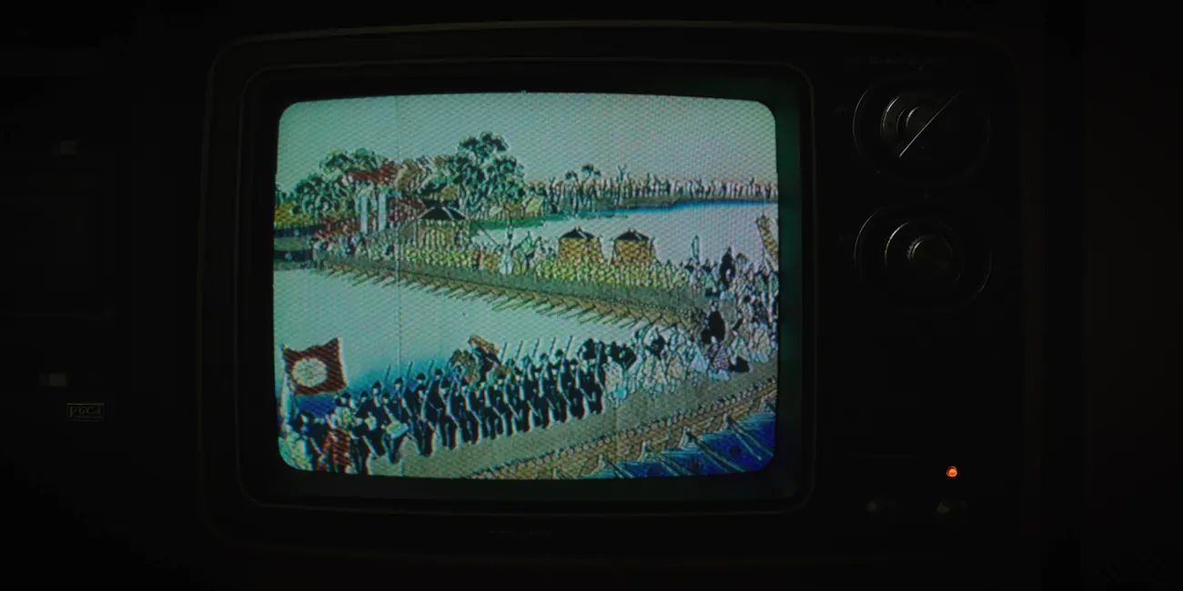 Nineteenth-century footage played on an analogue television and filmed off the screen.
