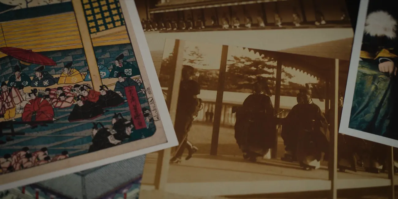 Woodblock prints and archive photographs laid out and lit on a table.